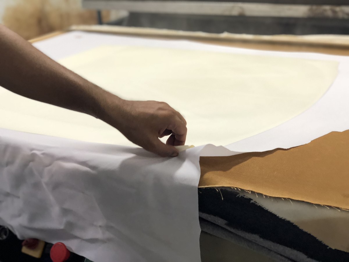 Marking fabric layers on the cutting table