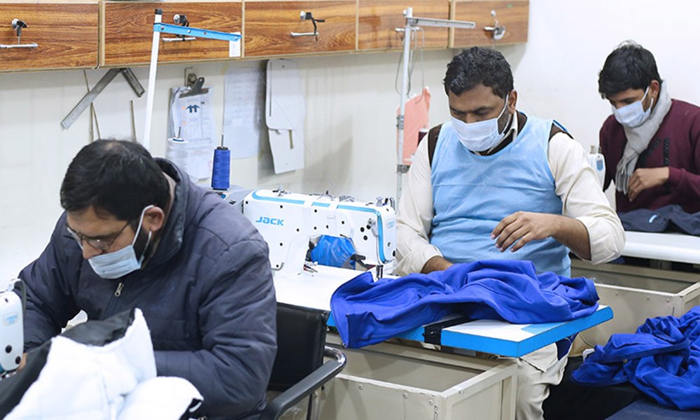 Sewing team assembling garments on the production floor