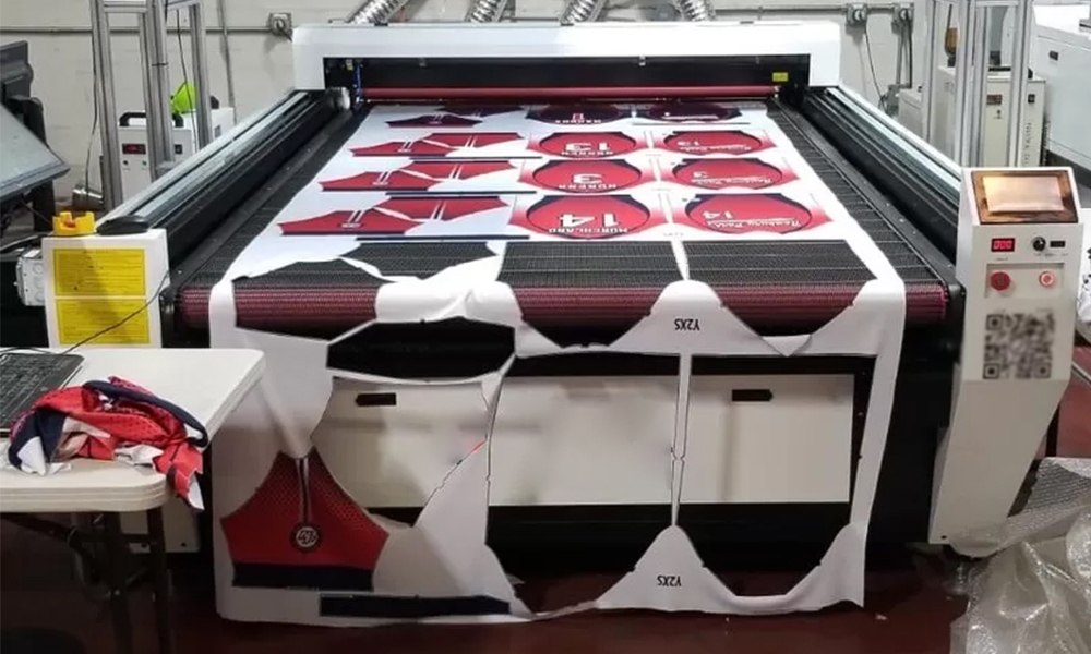 Wide-format sublimation printer running a jersey order